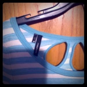 A light blue and white quarter sleeve top